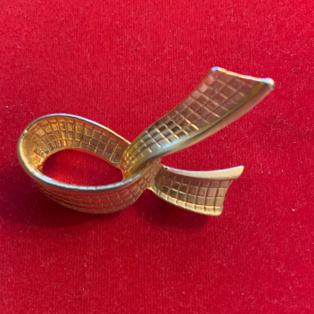 Gold Sculptural Brooch with Flowing Design